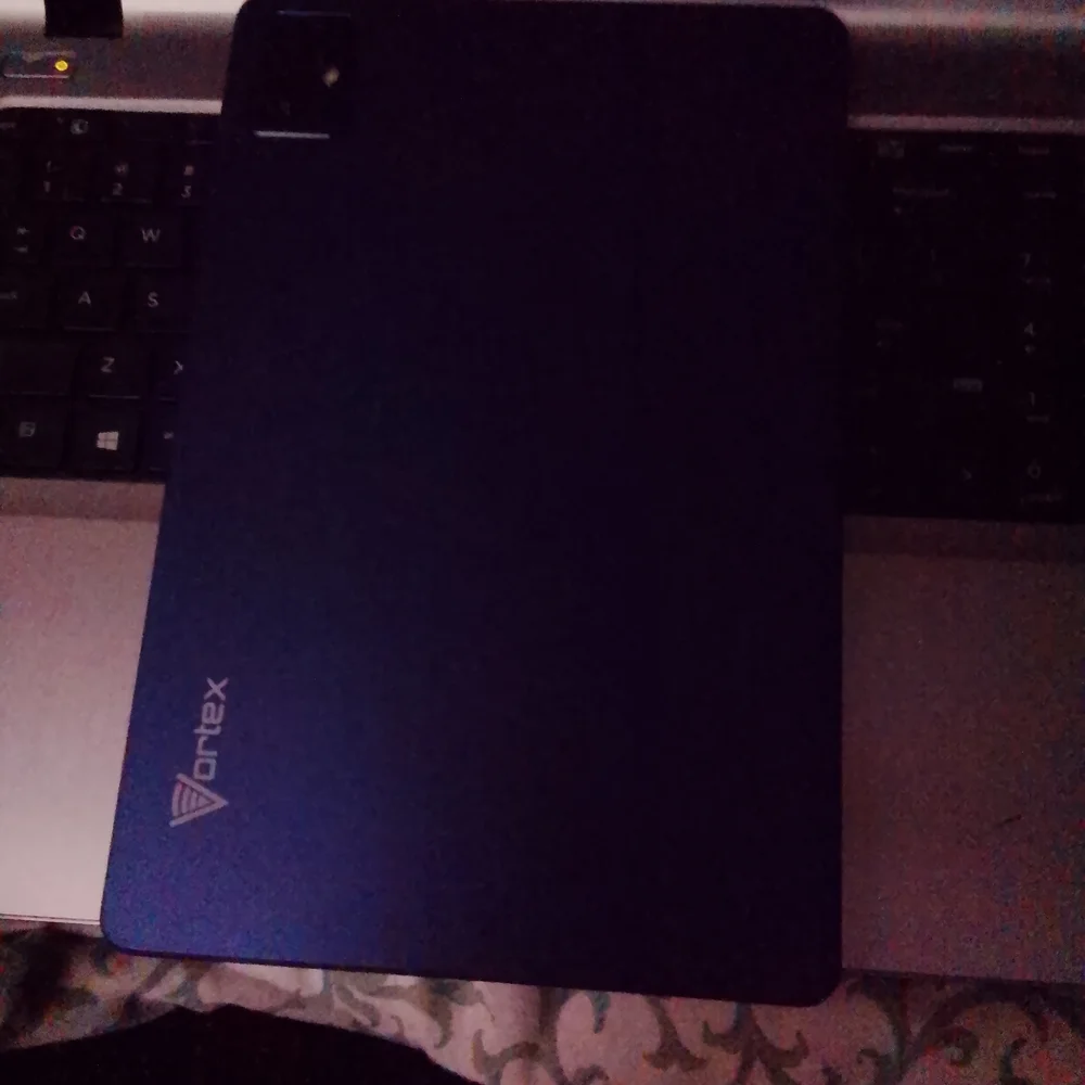 Sleek Black Vortex Tablet with Vibrant Display